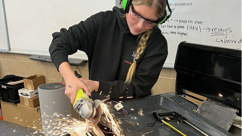 Fabricating the stove prototype with an angle grinder
